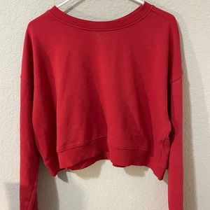 red long sleeve top